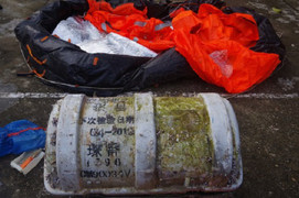 Phát hiện vật thể lạ ghi chữ Trung Quốc trôi dạt vào bờ biển Thừa Thiên Huế