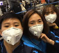 Tuyển nữ Việt Nam đeo khẩu trang lên đường dự vòng loại Olympic