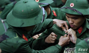 Tân binh sốt quá 7 ngày sẽ không được nhập ngũ