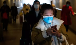 Người Trung Quốc ôm nỗi lo lây nhiễm virus corona trở lại làm việc