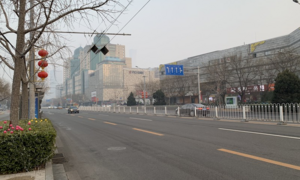 Ảnh: Đường phố Bắc Kinh vắng lặng vì dịch Covid-19