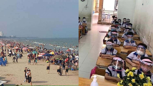 Bãi biển kín người không đeo khẩu trang, sao bắt học sinh 'hóa' robot trong lớp?