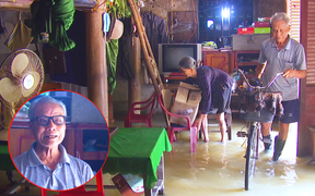 Vợ chồng cụ ông 90 tuổi trắng đêm chạy lũ