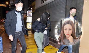 Cảnh sát đào bới bãi rác để tìm kiếm thi thể của người mẫu Hong Kong