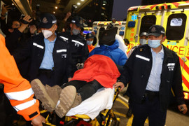 Cảnh sát đào bới bãi rác để tìm kiếm thi thể của người mẫu Hong Kong