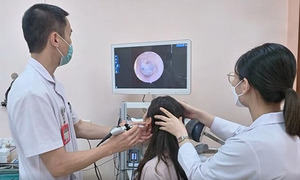 Từ không vay nổi 200 nghìn đến hành trình trở lại của nữ phiên dịch mất thính lực