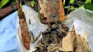 Quy tập 2 hài cốt liệt sĩ cùng bộ đàm, quân trang trong vườn cà phê ở Đắk Lắk