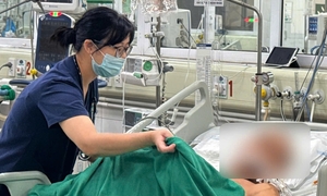 Hôn mê sau hai ngày ăn tiết canh lợn