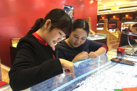 Giá vàng hôm nay 23/1 tăng dựng đứng