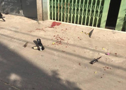 Để nước văng vào gã hàng xóm, người đàn bà bị sát hại dã man