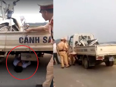 Bị giữ xe vi phạm, 9X chui vào gầm xe CSGT 'ăn vạ'