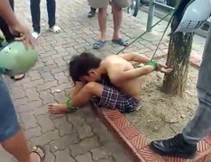 Tạm giữ 3 người trói thiếu niên đánh giày vì nghi trộm tiền ở Hà Nội