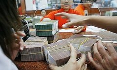 Vay dưới 100 triệu đồng mới được giải ngân bằng tiền mặt
