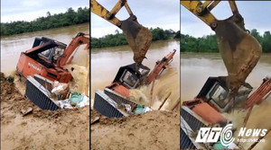 Cận cảnh dìm máy múc hàng trăm triệu đồng xuống chân đê ngăn nước lũ ở Thanh Hóa