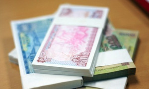 Dịch vụ đổi tiền lẻ lì xì Tết 'hét' phí tới 400%