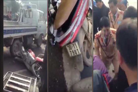 Dừng chờ đèn đỏ, xe máy bị xe CSGT tông văng gần 3 mét