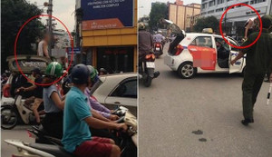 Bị CSGT dừng phương tiện, tài xế taxi leo lên nóc xe ăn vạ