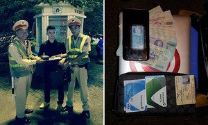 CSGT Hà Nội trả lại chiếc cặp chứa kim cương cho nam thanh niên đánh rơi