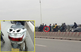 Bỏ lại xe máy, người đàn ông nhảy sông Hồng tự tử