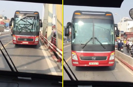Đi vào đường ngược chiều, xe khách bật đèn khẩn cấp lùi trên cầu Chương Dương