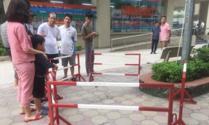 Danh tính nghi phạm đi ô tô bắn 2 phát súng khiến vợ bị thương ở Hà Nội