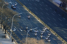 Ảnh: Đoàn xe hộ tống ông Kim Jong-un trên đường phố Bắc Kinh