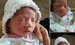 Bé gái kháu khỉnh, đỏ hỏn bị bỏ rơi trước chùa