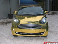 Xe dát vàng Aston Martin Cygnet lung linh trên phố