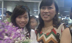 Chùm ảnh: Đón các cô gái vàng TTVN về nước