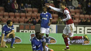Wigan 0-4 Arsenal: Đêm của Van Persie