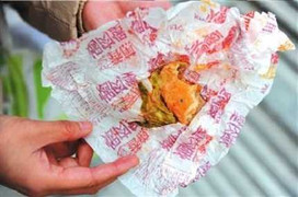 Thai phụ ăn phải mảnh sứ trong hamburger của KFC