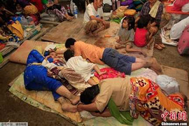 Ảnh thương tâm trận bão 652 người chết ở Philippines