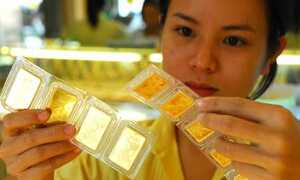 Ngân hàng 'mê' vàng hơn người dân