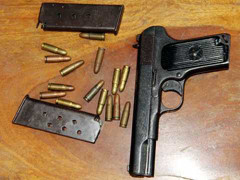 Phát hiện súng K54 trong phòng chánh án nhận hối lộ