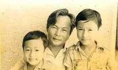 Hình tuổi thơ Nguyễn Quang Dũng bên nhà văn Nguyễn Quang Sáng