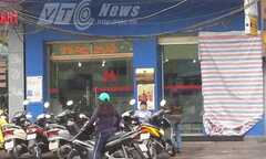 Người đàn bà dùng keo 502 phá máy ATM