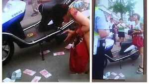 Clip: Thiếu nữ chửi bới cảnh sát, quăng tiền phạt xuống đất