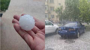 Mưa đá to như trứng gà 'oanh tạc' xe hơi ở Bắc Kinh