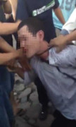 Clip: Cướp điện thoại bị dân trói đánh hộc máu mũi giữa phố Hà Nội