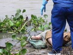 Phát hiện xác chết 2 tay bị cột trong bao tải đá