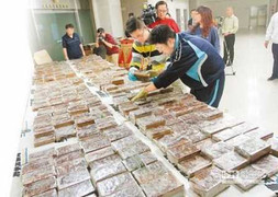 Cất giấu 149 bánh heroin nhà người tình