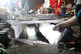 Bé 9 tuổi bị nước mưa cuốn mất tích dưới cống