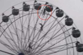 Thót tim xem giải cứu cô gái bị treo lơ lửng trên vòng quay khổng lồ