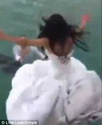 Cô dâu suýt chết đuối vì chụp ảnh cưới dưới nước