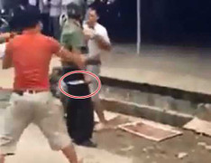 Làm rõ clip người đàn ông mặc sắc phục công an cầm dao đuổi tài xế xe tải