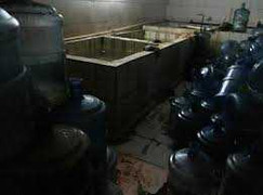 Đột nhập xưởng sản xuất nước rởm đóng bình