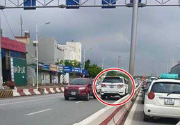 Xe hơi ngang nhiên lao ngược chiều trên cầu Vĩnh Tuy