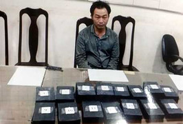 'Ngụy trang' 18 bánh heroin trong xe máy vận chuyển về Hà Nội