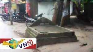 Rùng mình cảnh sống chung với nghĩa địa giữa Hà Nội