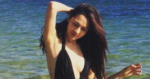 Bảo Anh khoe vòng một táo bạo trên bãi biển